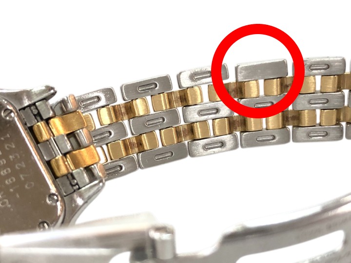 カルティエ パンテール クォーツ腕時計の金属バンド。新たに作製された駒が純正品のように美しい仕上がり。島根県松江市のメガネ時計宝飾 長谷川時計店での修理事例。